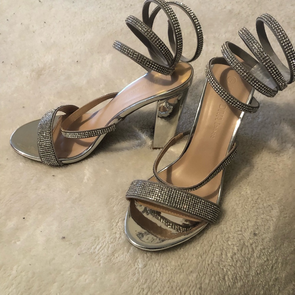 Silver Strappy Heeled Sandals
New never worn
Great for prom or evening wear